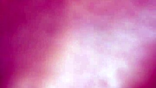 Exploring intimate moments with a partner using toys.