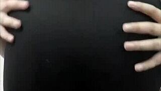 Undressing Doña Mary in her room as her husband leaves.