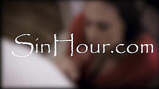 Ebony woman with big tits and tiny girl engage in lesbian action on the sofa