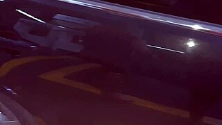 The gas station attendant fucks the naked girl outdoors.