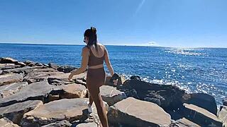 wife enjoys homemade beach handjob