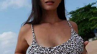 waiting for you on the sunny beach in a bikini, petite and ready