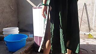 Sexy big boobs bhabhi bathes outdoors, revealing wet pussy and tits in intriguing display