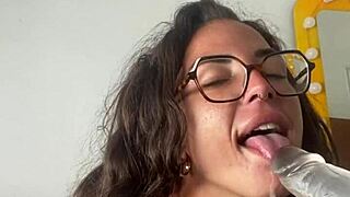 horny tattooed brunette masturbates with sex toys