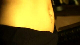 beautiful indian brunette performs erotic striptease by undressing and ripping clothes nude on stage