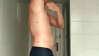 Sexy Guy In Black Beach Shorts Shaves While Fucking Feet In Bathroom