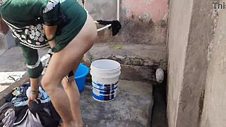 Sexy big boobs bhabhi bathes outdoors, revealing wet pussy and tits in intriguing display