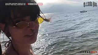 Perverted Woman Shows Tits On Beach, Takes To Rocks For Fucking