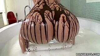 blonde enjoys chocolate syrup on her big ass