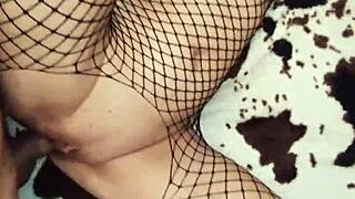 Fishnet underwear looks very exciting on her.