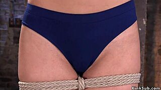 Hairy pussy beauty in hogtie gets caned!