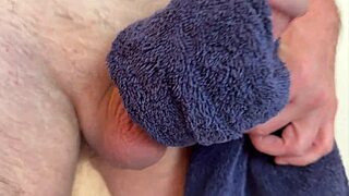 Intensely masturbating to a powerful orgasm.