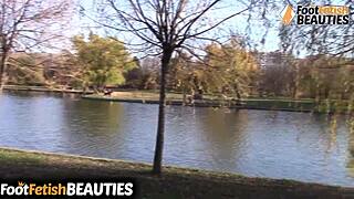 Brunette Babe Goes Barefoot in Park