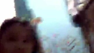 indonesian girl relaxes in bath on webcam