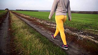 Voyeur watches women walking outdoors in tight yoga pants