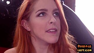 Bound redhead nipple clamped and zapped in kinky threesome domination.