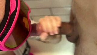 In the bathroom, he flashes his dick and cums on her face during the adventure.