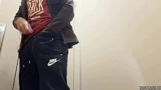 watch this hunky stud get naughty in public bathroom