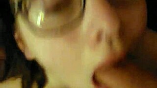 Belle tied down for throat use in domination scene