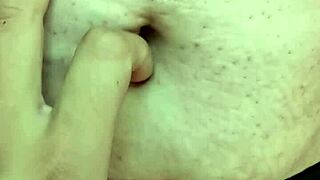 Exploring a milf's navel during a relaxing massage session