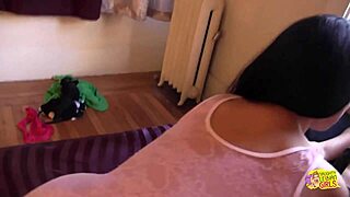 Blonde with crew cut playfully shoves butt plug into her lesbian friend's ass