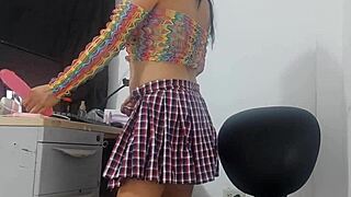 Sweet Girl in Miniskirt and Fishnet Stockings Takes Huge Horse Dildo