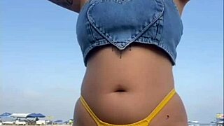 Watching her flash on the african beach made my heart race with intense desire