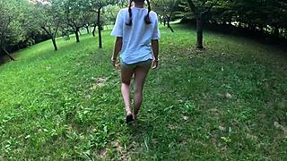 Perfect ass strips while walking in the woods