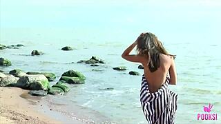 Tanned brat Juliette had a lot of fun stripping off at the beach