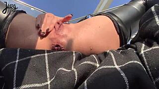 Does this brunette babe squirt publicly while riding a dildo on the ferris wheel, LaraJuicy?