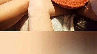 that mature mom is giving a sloppy blowjob to her stepson in the kitchen