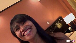 tourist films asian mature woman during amateur encounter at hotel with smartphone