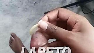 labeto's safe sex hot masturbation ends with cumshot in condom to sex machine song