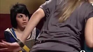 Girls Engaging In Kissing During A Fun Game Session