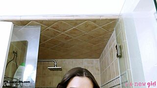 Fierce and flawless brunette steps into the shower, letting the water cascade over her petite frame during the photoshoot interview.