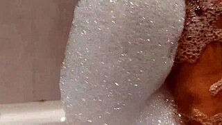 Tanned Stepsister's Big Tits Tease In Bathroom