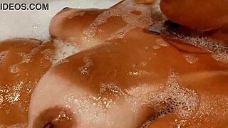 Tanned Stepsister's Big Tits Tease In Bathroom