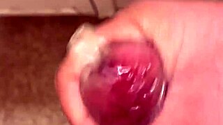 Milk spurting everywhere as i cum hard masturbating with condom!!