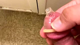Milk spurting everywhere as i cum hard masturbating with condom!!