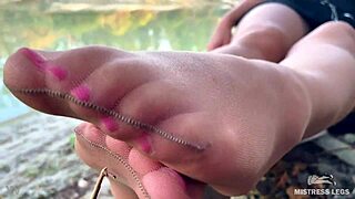 my cute feet in nude tights rubbing on autumn river bank 😍