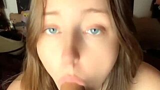 she sucks dildo then teases her pussy