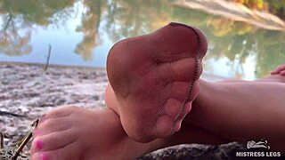 my cute feet in nude tights rubbing on autumn river bank 😍