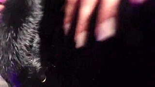 that hot brunette slips fingers and vibrator deep into her fishnet-covered pussy