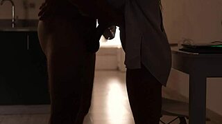 brunette girlfriend deepthroats huge cock in kitchen then swallows.