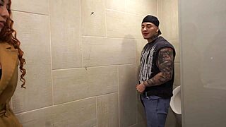 busty redhead sneaks mens bathroom stares big dick cant look away