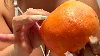 curvy bbw tattooed beauty teases fat ass with fruit fetish