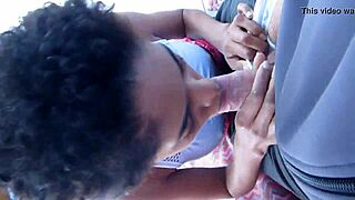 Ebony slut chokes monster cock on balcony pov