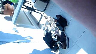 Ebony slut chokes monster cock on balcony pov