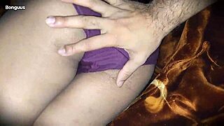 He sneaks under the blanket with his stepmom, fingers her wet pussy until she squirts wildly