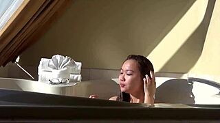 This cute asian 18yo teases wet machine in jacuzzi tub
